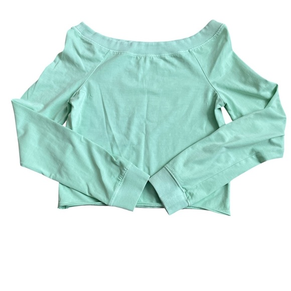 NWOT Free people movement top.Mint green. 
Size L. - Picture 1 of 3